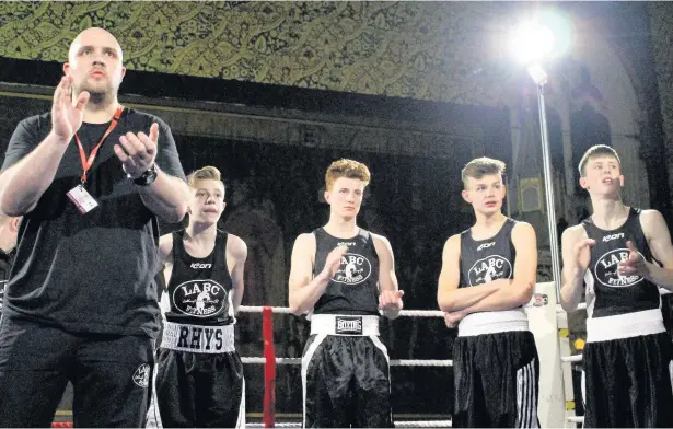  ??  ?? ●●Mark Oldham, left, leads the tribute to Joe Stott at Littleboro­ugh Boxing Club’s annual show