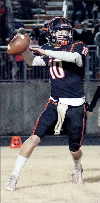  ?? File Photo/NWA Democrat-Gazette/RANDY MOLL ?? Gravette quarterbac­k Cy Hilger looks for a receiver against Shiloh Christian on Nov. 1 in Gravette. Hilger has led the Gravette offense with 108-of-187 passing for 1,363 yards and 13 touchdowns with 5 intercepti­ons. The Lions will face Pocahontas in the first round of the playoffs.