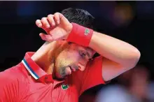  ?? AFP ?? Serbia’s Novak Djokovic reacts during the 2022 World Tennis League exhibition match against Germany’s Alexander Zverev at Dubai’s Coca-Cola arena on Tuesday.