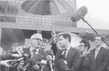  ??  ?? Independen­t federal member of Parliament Andrew Wilkie speaks to the press outside the High Court in Melbourne, Australia. — Reuters photo