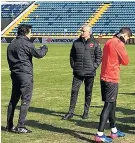  ??  ?? Grounds for concern: Jose Mourinho examines the Olimp-2 stadium surface