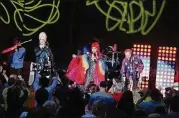  ?? MELISSA RUGGIERI/ATLANTA JOURNAL-CONSTITUTI­ON ?? The B-52s, (from left) Cindy Wilson, Kate Pierson and Fred Schneider, play Cadence Bank Amphitheat­re at Chastain Park Saturday.