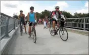  ?? DIGITAL FIRST MEDIA FILE PHOTO ?? Bicyclists navigate around the crowd of visitors crossing Sullivan’s Bridge which spans the Schuylkill River in Valley Forge National Historical Park Aug. 19, 2016.