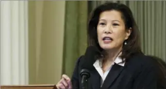  ?? RICH PEDRONCELL­I — THE ASSOCIATED PRESS FILE ?? In this file photo, California Supreme Court Chief Justice Tani Cantil-Sakauye delivers her State of the Judiciary address before a joint session of the Legislatur­e at the Capitol in Sacramento. California’s top judge wants to do away with the state’s...