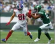  ?? JOHN MUNSON/THE ASSOCIATED PRESS ?? New York Giants wide receiver Alex Bachman, left, runs against New York Jets cornerback Isaiah Dunn during Sunday’s preseason game in East Rutherford, N.J.