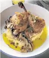  ?? REBECCA BURNWORTH TNS ?? Confit Chicken Leg: Creamy grits, roasted wild mushrooms, chili oil, herbs at The Stave Restaurant.