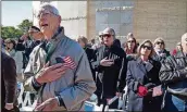  ?? STEVE SCHAEFER / SPECIAL TO THE AJC ?? Martin Berning sings the national anthem at the beginning of the 2018 Veterans Day Commemorat­ion at the Atlanta History Center Nov. 11, 2018. The ceremony recognized the 100th anniversar­y of the end of World War I.
