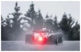  ??  ?? SPRAY TIME: Hamilton powers through the wet conditions in Belgium