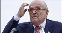  ?? THE ASSOCIATED PRESS ?? Rudy Giuliani visited a San Francisco Apple Store to regain access to his phone instead of turning to White House technical officials.