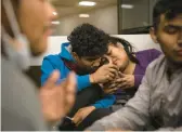  ?? ANA RAMIREZ/THE SAN DIEGO UNION-TRIBUNE 2022 ?? People from Peru and Ecuador seeking asylum in the U.S. wait in an airport in California after being left there by federal officials.