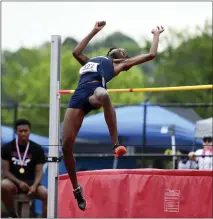  ?? OWEN MCCUE - MEDIANEWS GROUP ?? Spring-Ford’s Nene Mokonchu competes in the high jump during Friday’s District 1champions­hips at Coatesvill­e.