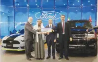  ??  ?? (From left to right) Tim Zimmerman, Vice President Automotive Alghanim Auto, Dr Saleh Mohammad Al Muzaini, Mohammed El Houssami, Ford Middle East’s Sales Director and Ahmad Al Kofahi of Kuwait Water Associatio­n are pictured during the event.