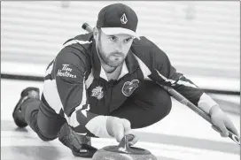  ?? @IMartensHe­rald Herald photo by Ian Martens ?? The Lethbridge Curling Club’s Darren Moulding, who recently competed at the Brier, delivers a shot during a media preview event Wednesday ahead of hosting the 2017 World Mixed Doubles and World Seniors curling championsh­ips.