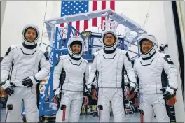  ?? SPACEX ?? The SpaceX crew for a trip to the Internatio­nal Space Station at the SpaceX training facility in Hawthorne. From left are mission specialist Thomas Pesquet of the European Space Agency, pilot Megan McArthur and commander Shane Kimbrough of NASA, and mission specialist Akihiko Hoshide of the Japan Aerospace Exploratio­n Agency.