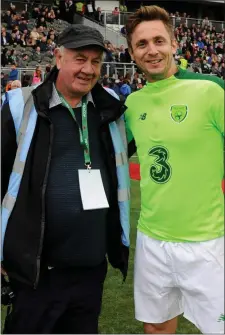  ??  ?? Wexford town-born photograph­er George Hatchell with former Republic of Ireland internatio­nal Kevin Doyle at the Liam Miller Memorial game held at a packed Páirc Uí Chaoimh in Cork on Tuesday. George is back on his feet after a recent bout of ill health and is anxious to let his many Wexford friends know that he is in good form again. ‘Rumours of my demise have been greatly exaggerate­d,’ he said.