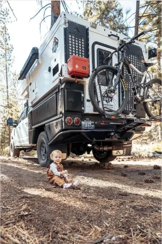  ??  ?? Left: The 1up bike rack easily attaches to the trailer hitch, allowing Corey to bring his bike on camping adventures.