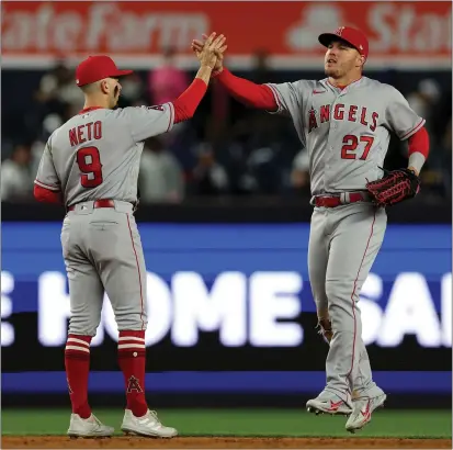  ?? ELSA — GETTY IMAGES ?? Shortstop Zach Neto and center fielder Mike Trout are among the players who will need to have big seasons for the Angels to improve.