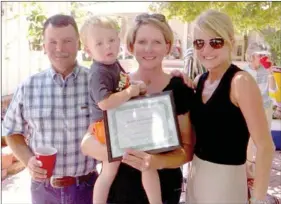  ?? COURTESY PHOTOS ?? The Randy West family hosted the Prairie Grove “Focus On Agricultur­e” picnic at their farm home off Viney Grove road last Thursday. A tree shaded backyard filled with fresh cut flowers from the nearby flower garden was the scene for the picnic. For...