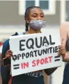  ?? COURANT FILE PHOTO ?? Members of the Uconn women’s rowing team rally in Storrs in April 2021.