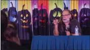  ?? ?? Greg Nicotero, a makeup designer for “The Walking Dead,” speaks Friday during the Midsummer Scream convention.