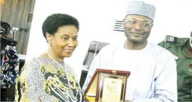  ?? ?? L-R: Former deputy president South Africa/leader of the delegation African Union (AU), Phumzile Mlambo-Ngcuka, with chairman INEC, Mahmood Yakubu, during the visit of AU Special Pre- Electoral Political Mission to the Commission in Abuja yesterday PHOTO BY REMI AKUNLEYAN