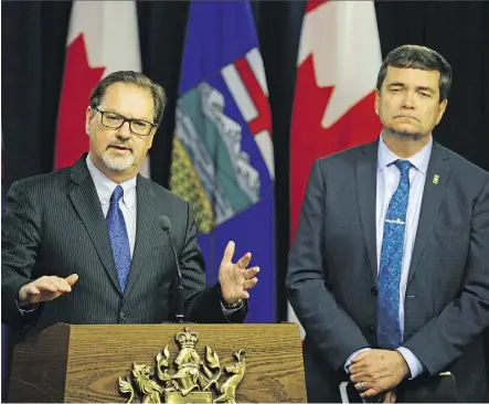  ?? LARRY WONG ?? Paul Whittaker, left, president & CEO of the Alberta Forest Products Associatio­n, and Alberta Agricultur­e Minister Oneil Carlier discuss U.S. lumber duties at the legislatur­e Tuesday.