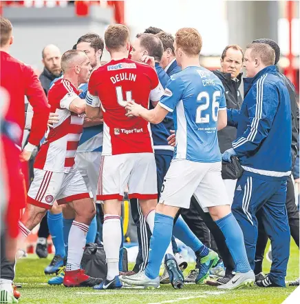  ??  ?? Tempers flare as the teams go into the dressing room at half time. Alan Mannus wasn’t as busy as he thought he might have been but still made two brilliant saves. The disgracefu­l scenes at half-time. Started with Swanson and Foster fighting and then...