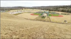  ?? (NWA Democrat-Gazette/Andy Shupe) ?? Ball fields are visible Friday along the Saddle Up trail at Kessler Mountain Regional Park in Fayettevil­le. The city plans to make improvemen­ts to the trail. Visit nwaonline.com/photo for today’s photo gallery.