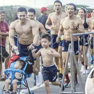  ?? ?? Start them young: The two sons of Awaken founder and coach Culver Padilla (shown pushing the toddler), Zeus in the stroller and Cloud running along his side, have their dad as their life coach and best friend. Following right behind is coach Melvin Te, Awaken Gym coach and co-founder.