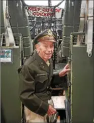  ?? DIGITAL FIRST MEDIA FILE PHOTO ?? In this 2013 file photo, Joseph Diemer, of Broomall, checks out the cockpit of a B-17 Flying Fortress in his World War II uniform at the Wings of Freedom tour at the Chester County Airport in Valley Township.