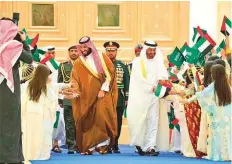  ?? Courtesy: Twitter ?? Shaikh Mohammad Bin Zayed Al Nahyan and Prince Mohammad Bin Salman being greeted in Abu Dhabi yesterday. Below: A ceremonial flypast in Abu Dhabi.