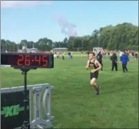  ?? NATE BARNES — THE NEWS-HERALD ?? Riverside’s Jack Condon nears the finish line at Madison’s U Wanna Come Back Invitation­al on Sept. 29.