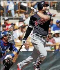  ?? MATT YORK — ASSOCIATED PRESS ?? Yonder Alonso watches his RBI hit during a spring training game against the Dodgers March 5.