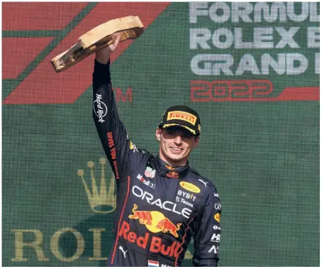 ?? REUTERS ?? Unstoppabl­e: Max Verstappen celebrates his victory at the Belgian Grand Prix. With just eight rounds to go, Verstappen can seal the title as early as the Japanese Grand Prix if he nets another 11 points over the next four rounds.