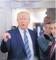  ?? PABLO MARTINEZ MONSIVAIS/ASSOCIATED PRESS ?? President Donald Trump speaks to members of the media aboard Air Force One before his departure from Andrews Air Force Base in Maryland on Saturday.