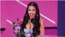  ??  ?? Olivia Rodrigo took home a Moon Person statue for best new artist