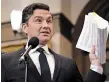  ?? JUSTIN TANG THE CANADIAN PRESS ?? Conservati­ve Leader Pierre Poilievre holds up recently released documents about two scientists who were fired.