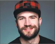  ?? Contribute­d photo ?? Musician Sam Hunt joins Kip Moore and Connor Smith at the Xfinity Theater in Hartford on June 29.