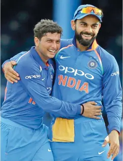  ?? — AP ?? Kuldeep Yadav (left) picked up three wickets in the second one-day.