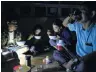  ?? PHOTO: REUTERS ?? A family eats in a shelter as Typhoon Molave lashes Vietnam’s coast in Binh Chau village, Quang Ngai province, yesterday.