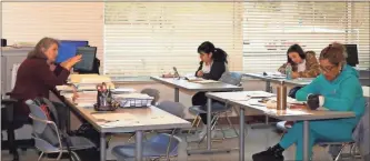  ?? GNTC ?? From left, Cindy Nelson, lead teacher and site manager for Adult Education for GNTC’S Whitfield Murray Campus, teaches Claudia Gutierrez, Kinsli Cordell and Patricia Gonzalez De Flores.