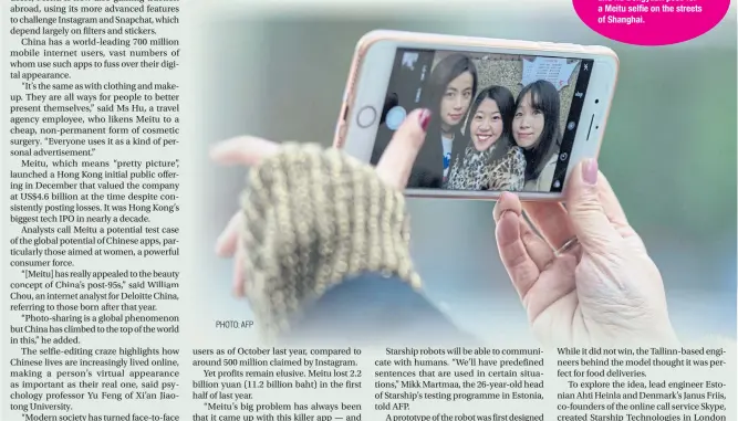  ?? PHOTO: AFP ?? PRETTY AS A PICTURE: From left, Peng Lin, Wang Peng and Hu Dongyuan pose for a Meitu selfie on the streets of Shanghai.