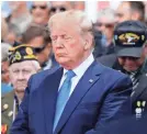  ?? ALEX BRANDON/AP ?? President Donald Trump honors the 75th anniversar­y of D-Day at the Normandy American Cemetery on Thursday in France.