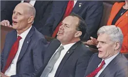  ?? Andrew Caballero-Reynolds AFP/Getty Images ?? U.S. SENS. Rick Scott (R-Fla.), left, Mike Lee (R-Utah) and Bill Cassidy (RLa.) jeer at President Biden as he delivers the State of the Union address Feb. 7. Republican­s balked at the president saying the GOP is targeting Social Security.