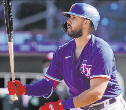  ?? Sue Ogrocki The Associated Press ?? Rangers’ outfielder Joey Gallo has worked on trying to hit more line drives after the pandemic season when he struggled at the plate.