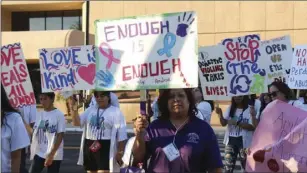  ?? WILLIAM ROLLER PHOTO ?? Participan­ts in the 14th annual March Against Domestic Violence march in El Centro on Wednesday.