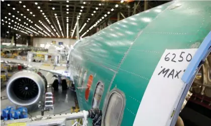  ?? ?? A Boeing 737 Max 9 under constructi­on at the production facility in Renton, Washington. Photograph: Jason Redmond/Reuters