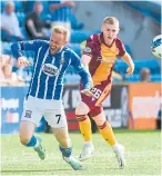  ?? ?? Kilmarnock­s’ Rory McKenzie and Ross Tierney clash