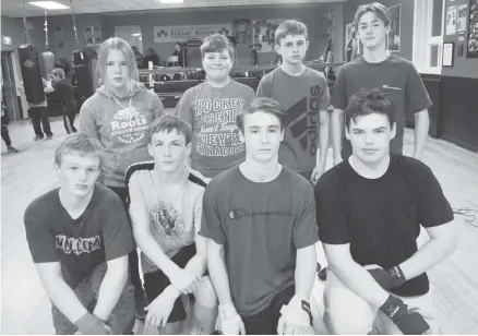  ??  ?? Shown are the local boxers scheduled to take part at the Albion Boxing Club’s Nov. 16 card. In front from left are Ian MacLeod, Cameron Munroe, Noah Thompson and Rob MacLeod. In back from left are: Sadie LeBlanc, Caden MacDonald, Carson Scholes and Tyver Stewart.