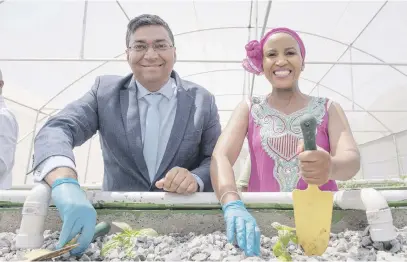  ?? Pictures: Refilwe Modise ?? GAME-CHANGER. Mondelez Africa managing director Swadheed Sharma and Gauteng member of the mayoral committee for health and social developmen­t Mpho Phalatse at the launch of a new aquaponics facility in Soweto this week.